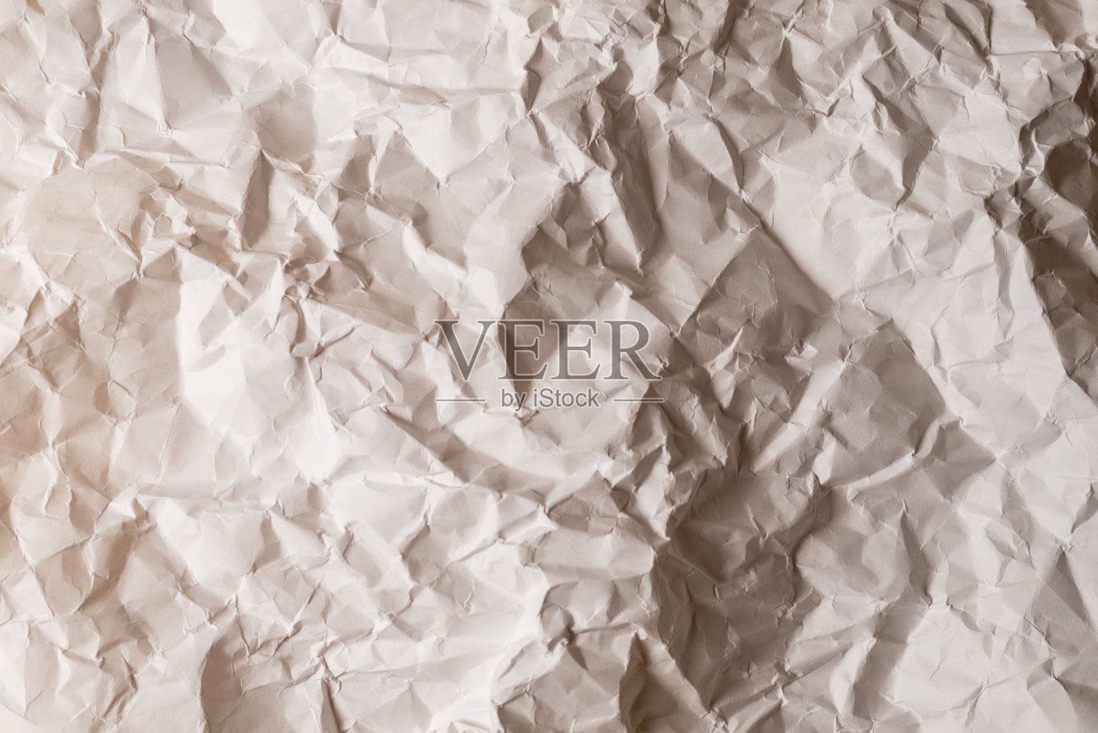 皱巴巴的白纸背景。照片摄影图片