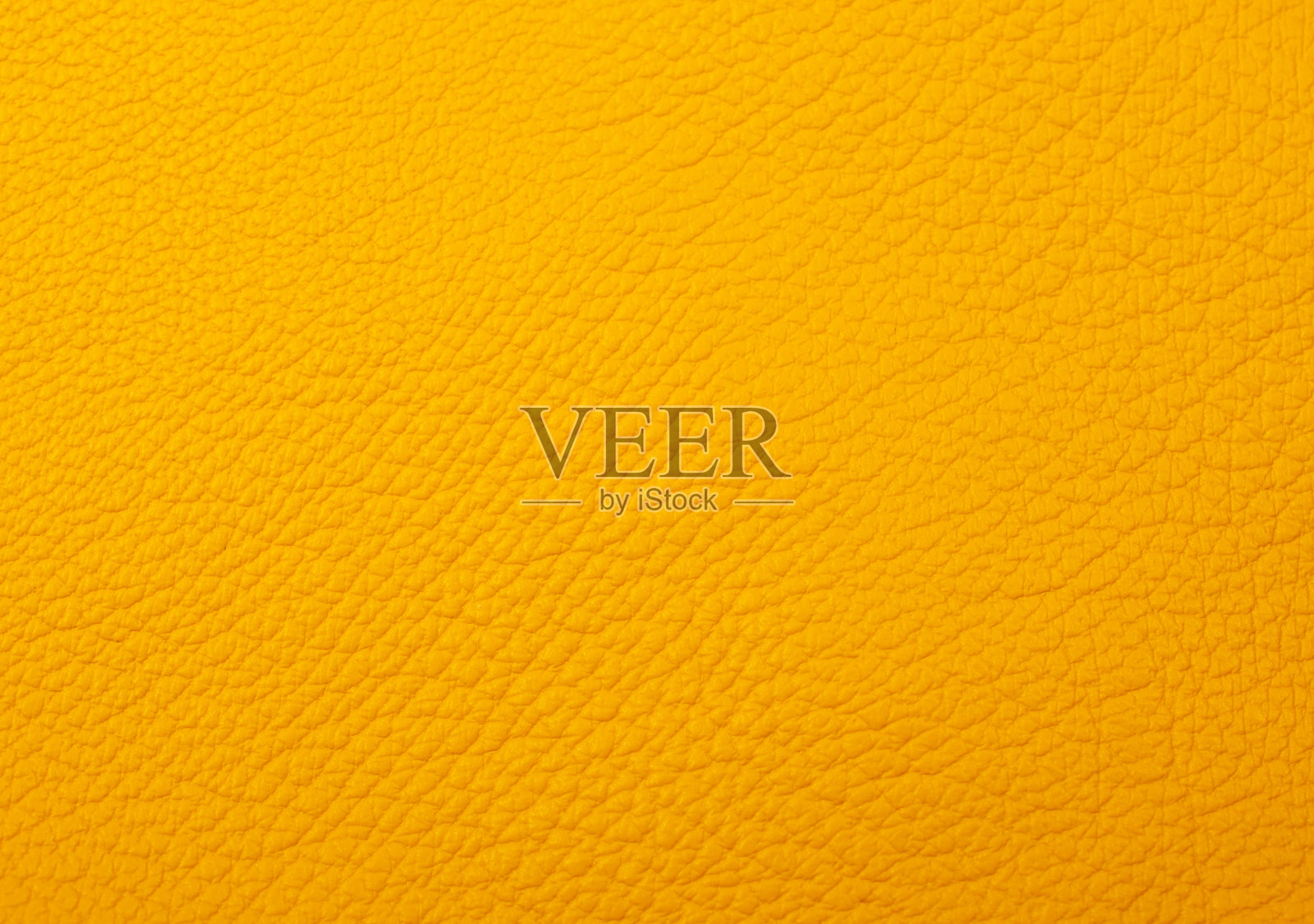 亮黄色皮革作为皮革纹理照片摄影图片