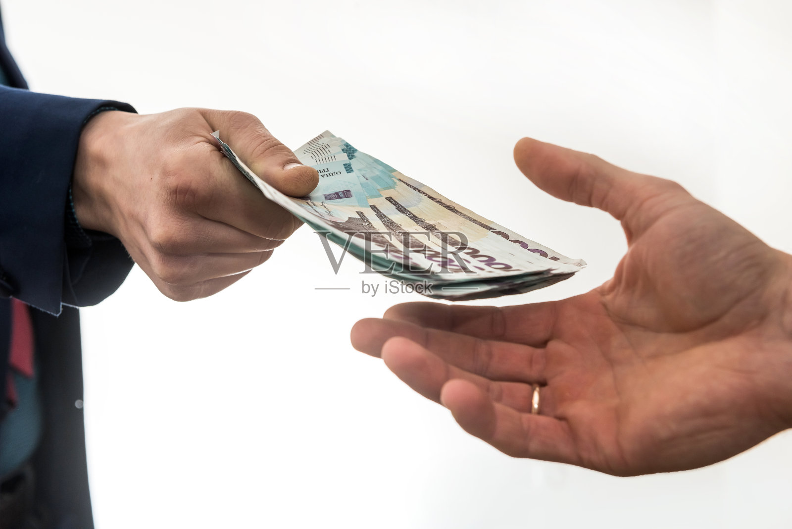 商人提供或接受贿赂的钱。乌克兰格里夫纳，新钞1000格里夫纳。照片摄影图片