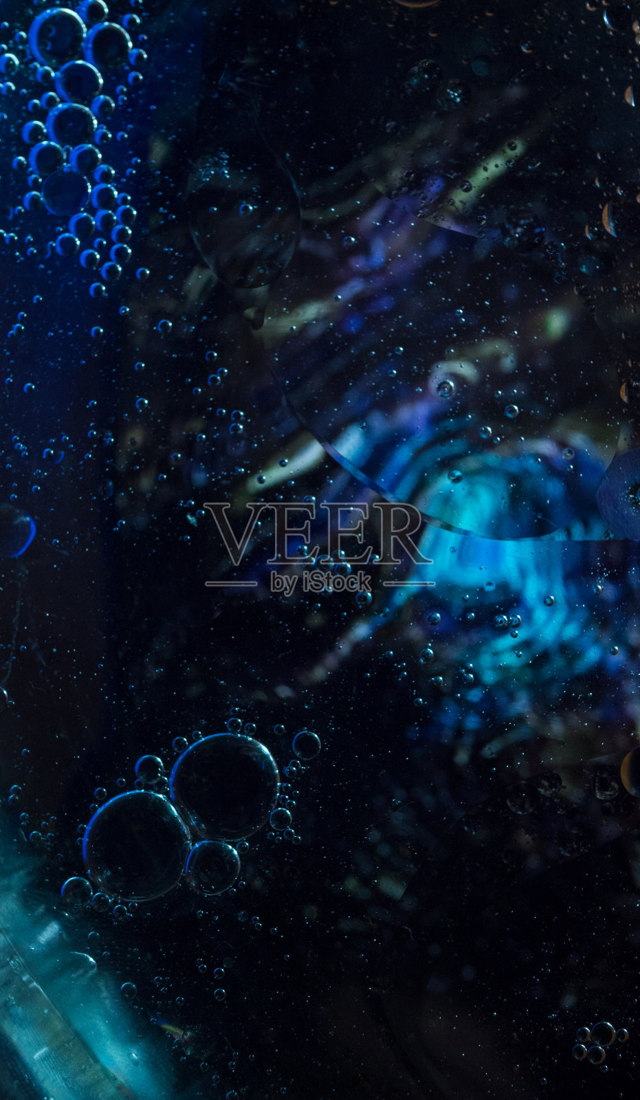 以水滴油的形象为现代创作设计背景照片摄影图片