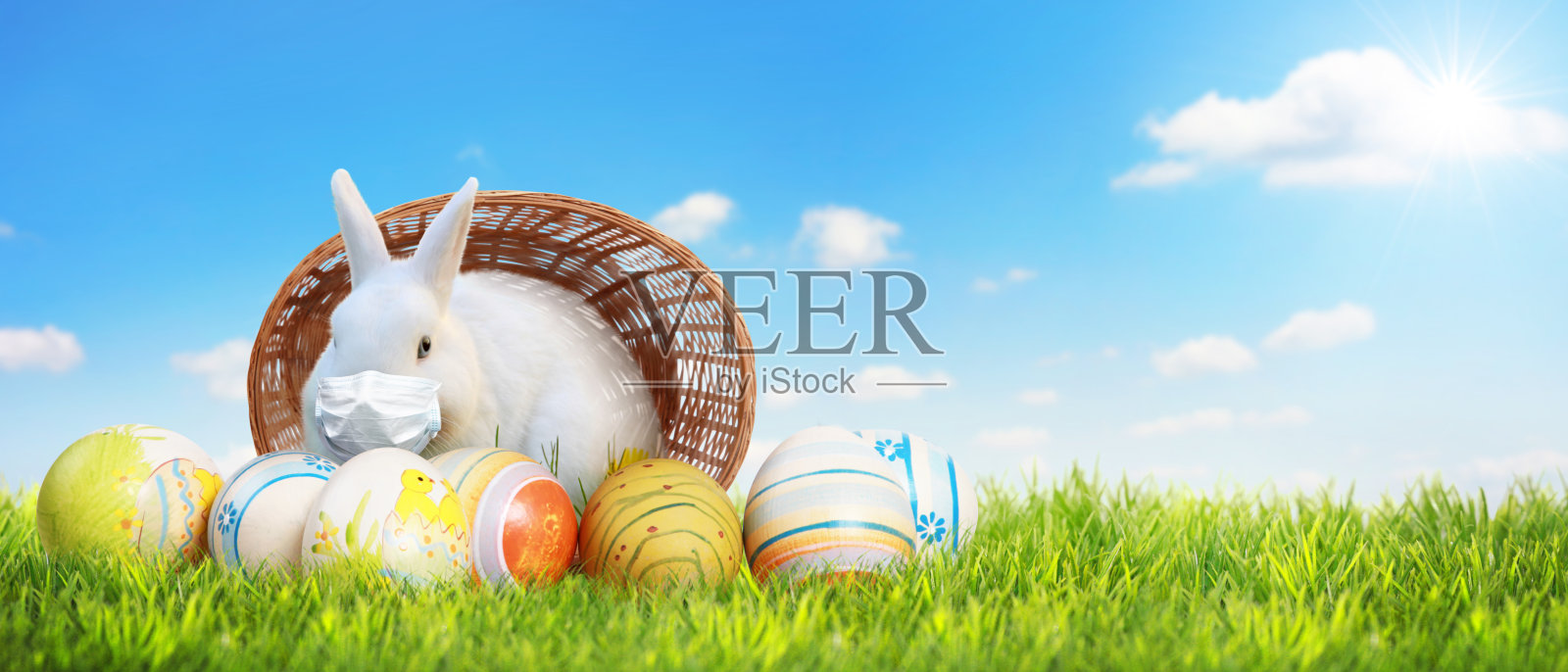 复活节兔子戴着医用口罩在疫情期间照片摄影图片