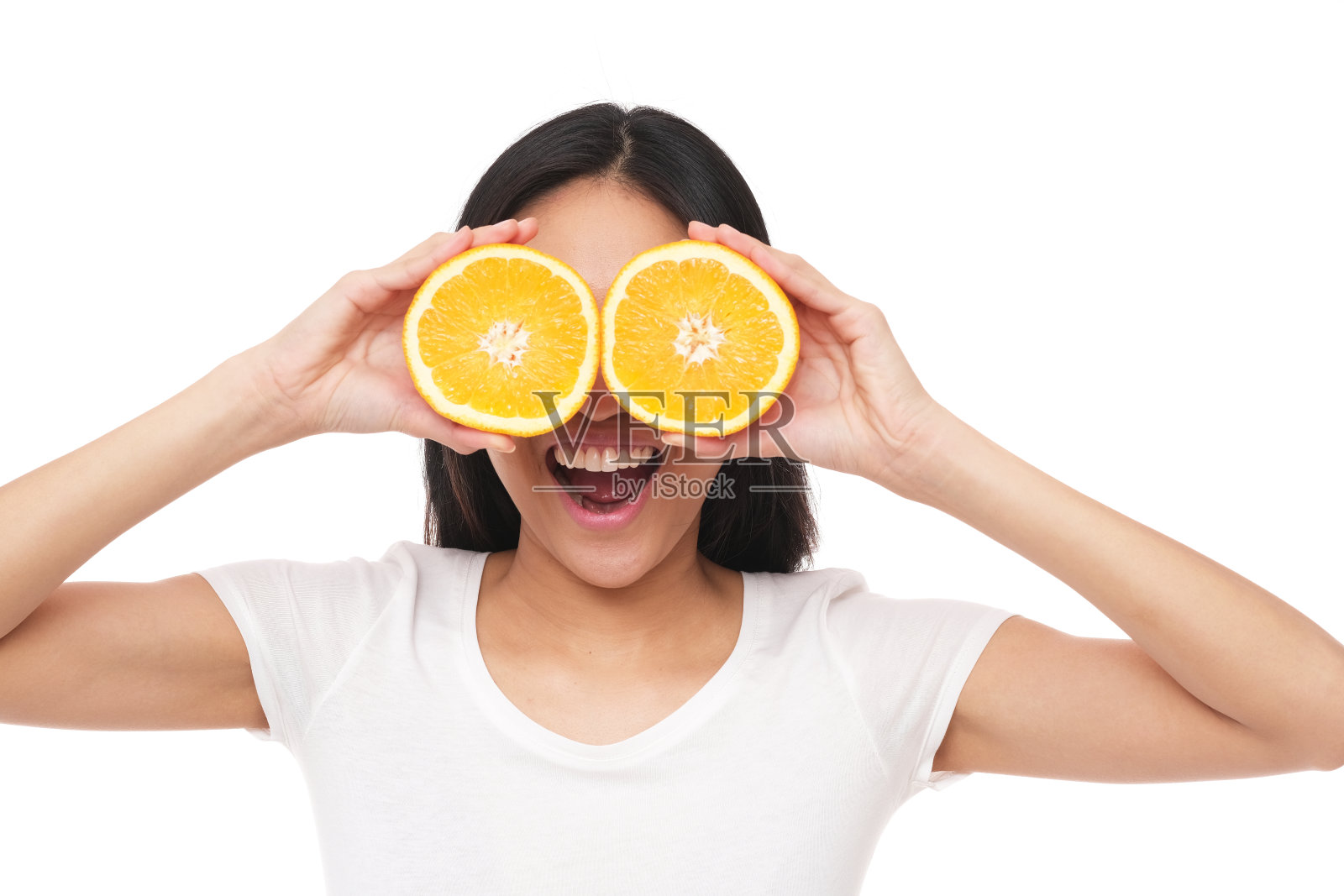 美丽的亚洲模特用柑橘做鬼脸。照片摄影图片
