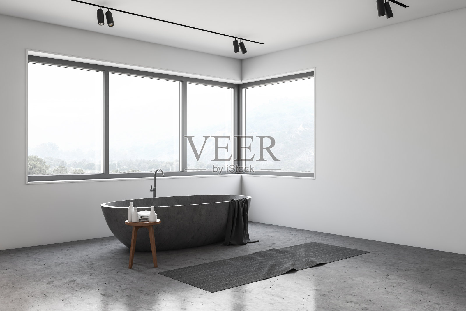 浴室的白色角落里有石头浴缸照片摄影图片