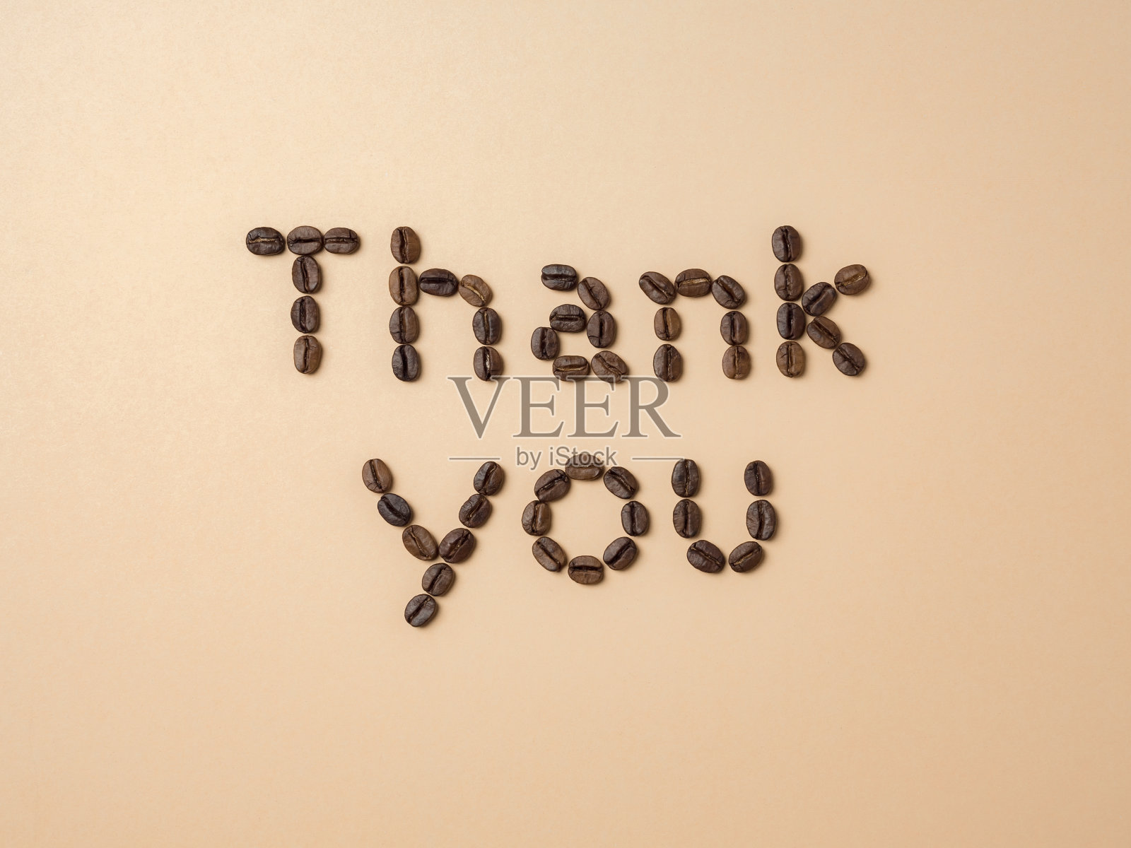 以字母排列的烘培咖啡豆照片摄影图片