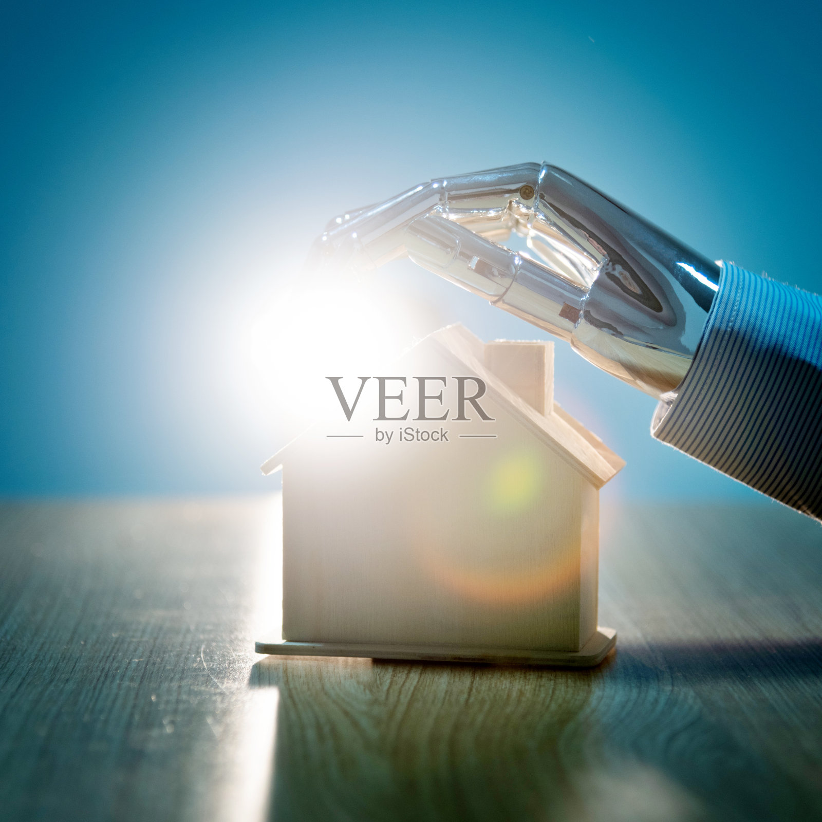 机器人手保护房子模型照片摄影图片