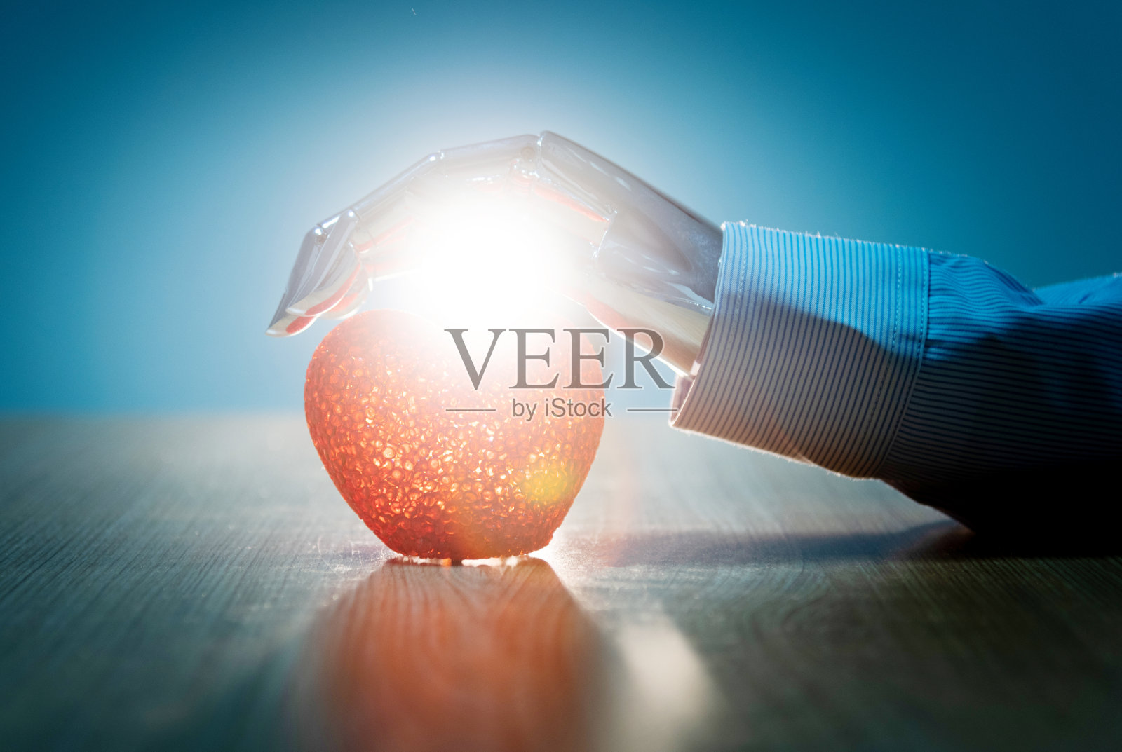 机器人手部保护心脏模型照片摄影图片