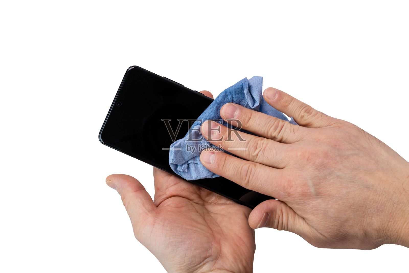 消毒过程中男性手持手机的特写。COVID 19。健康的概念。冠状病毒的关注。照片摄影图片