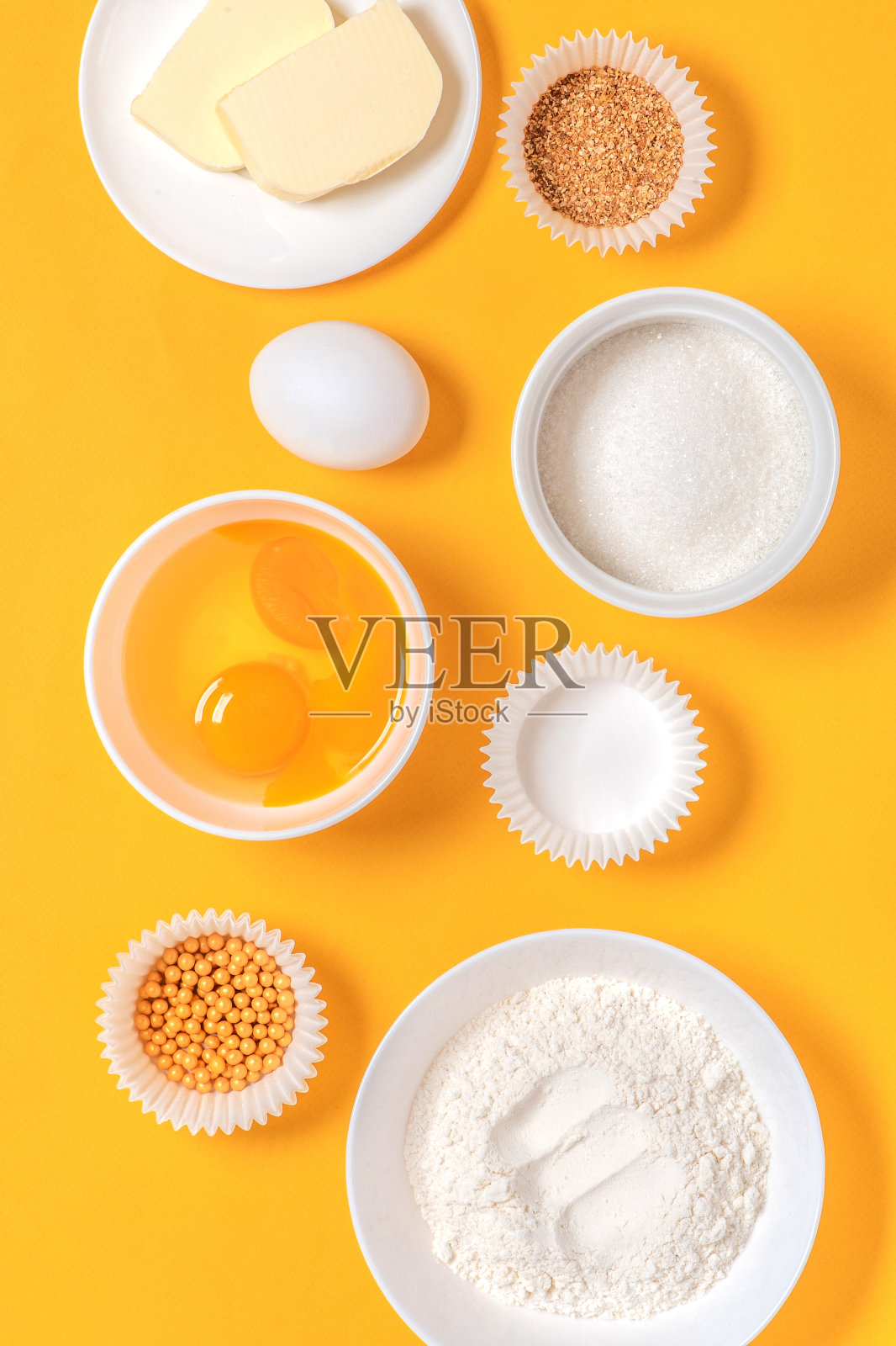 橘色背景的糕点配料照片摄影图片