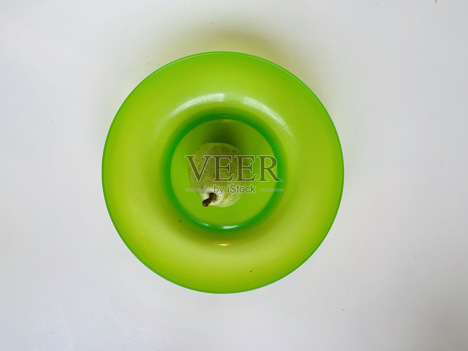 一个绿碗里的梨照片摄影图片