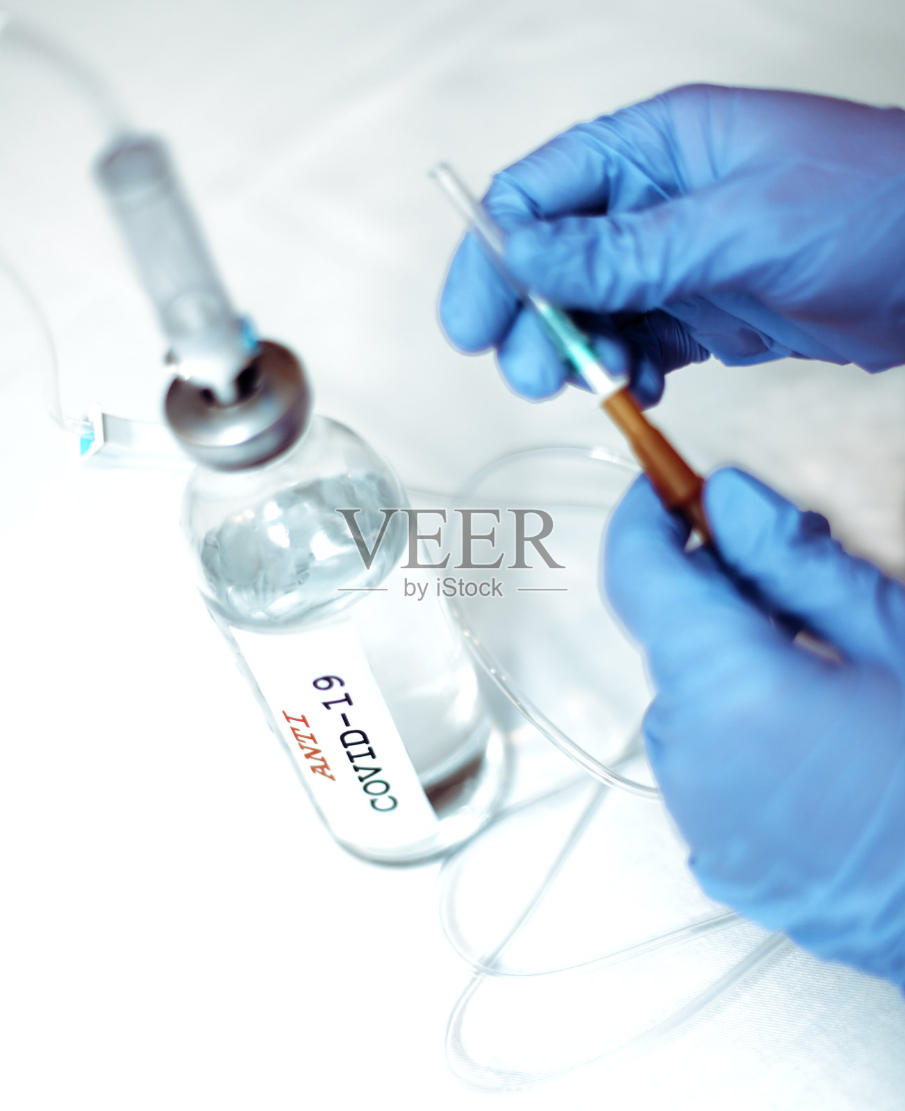 玻璃瓶，手套，注射系统照片摄影图片