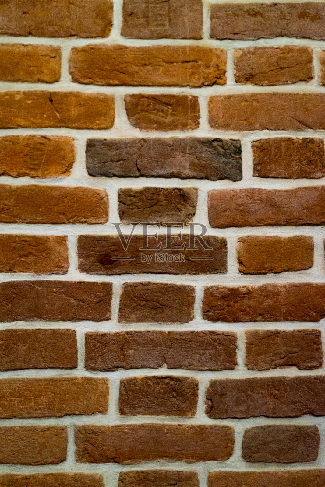 砖红墙和房子的背景。砖的房子。照片摄影图片