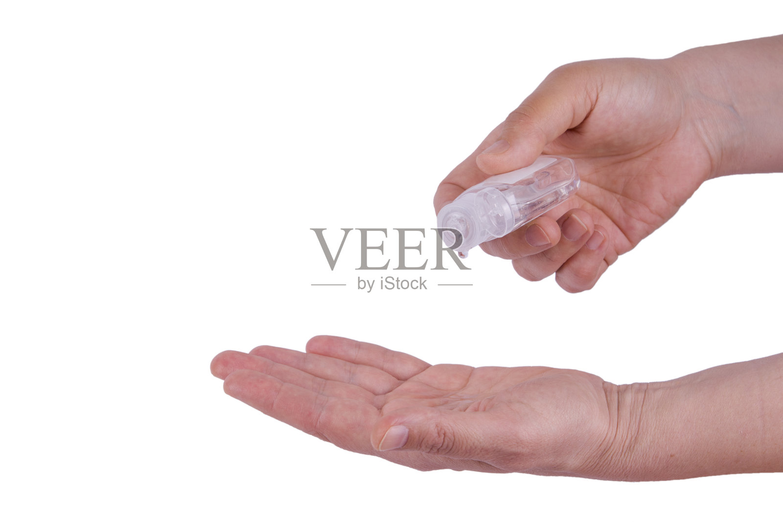 瓶内装有抗菌杀菌凝胶，用于手部消毒，用白色隔离物。阻止病毒感染和流行。卫生保健的概念照片摄影图片