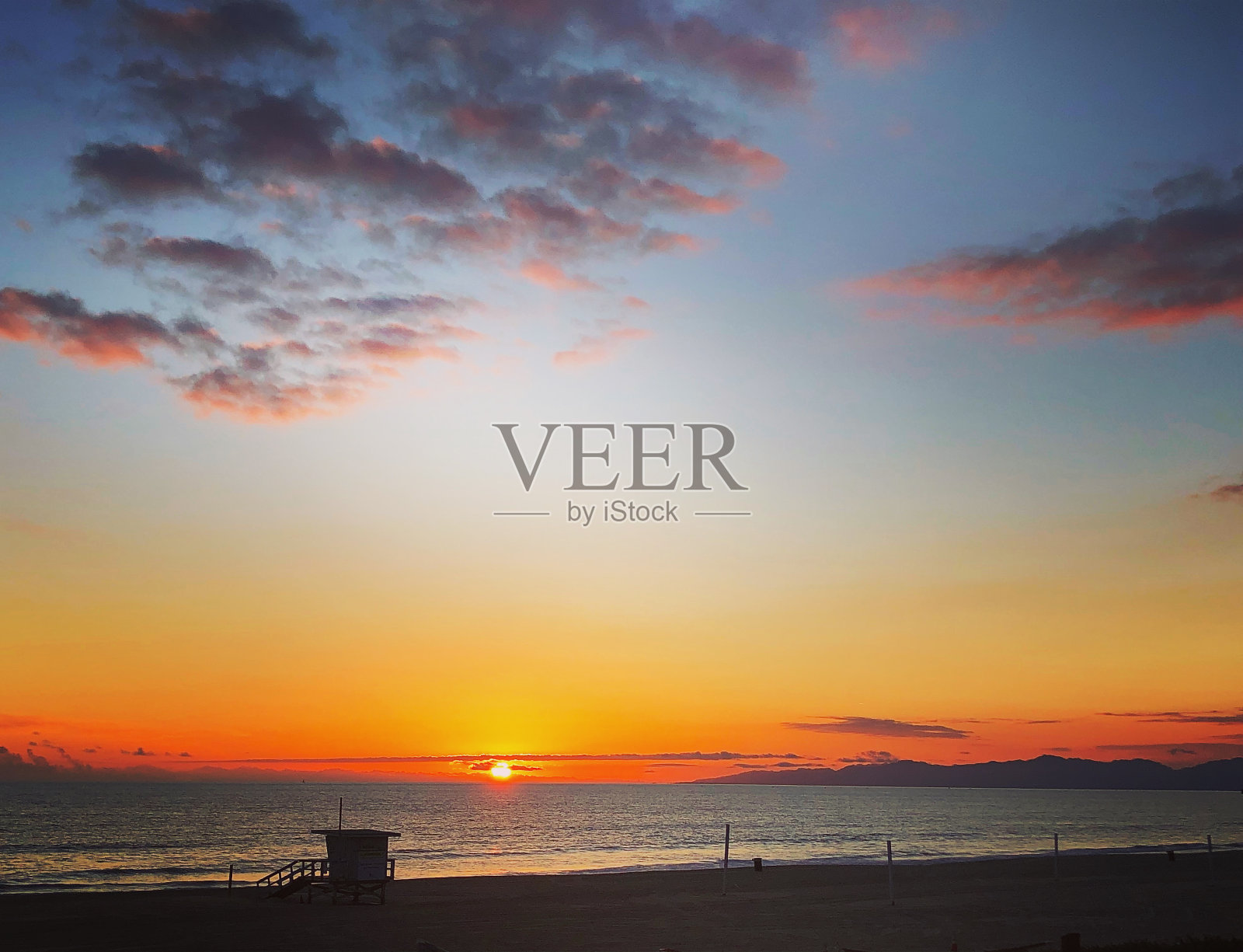 曼哈顿海滩的日落照片摄影图片