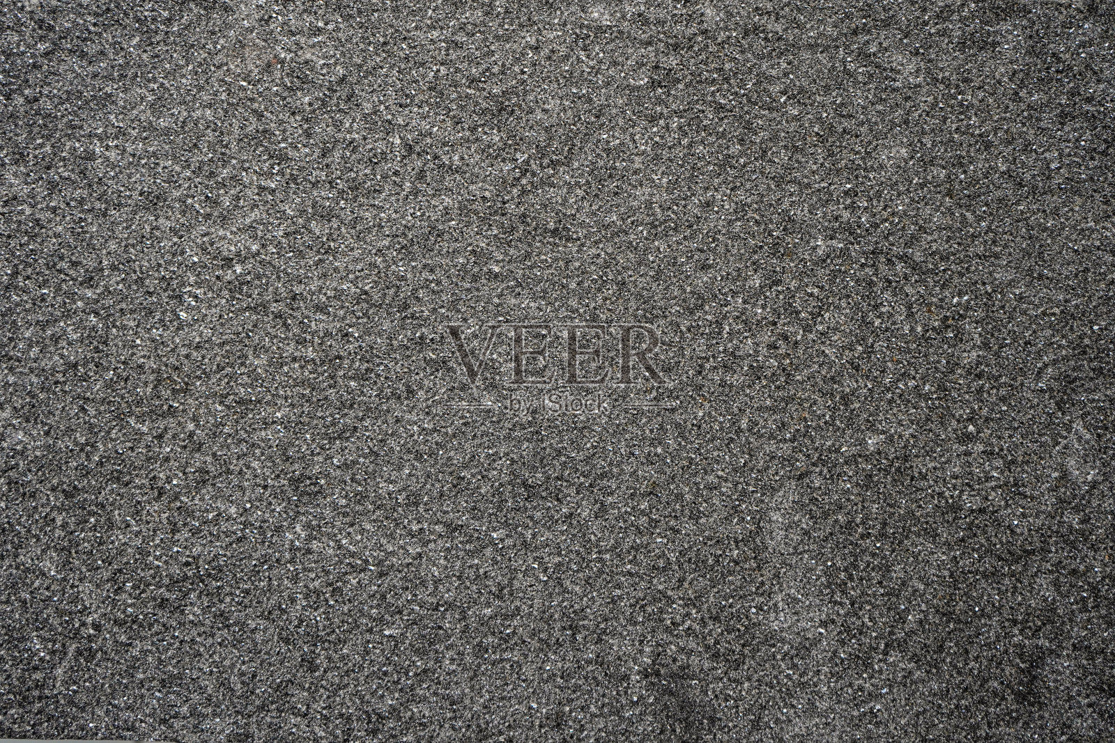 地面和墙壁以天然石材的形式覆盖，用于饰面、景观和室内。照片摄影图片