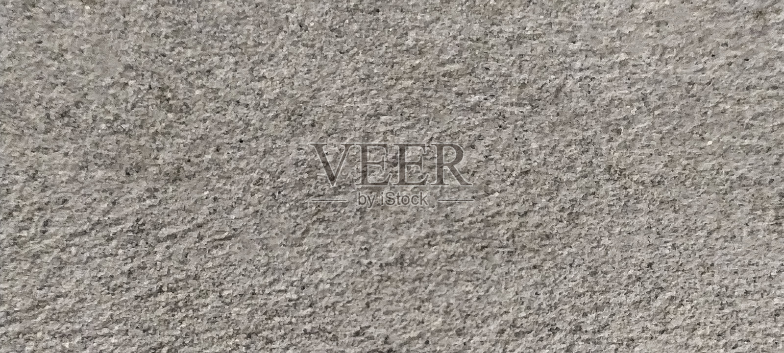 细砂质地光亮，结构自然。饰面石材纹理。细砂屑，棕色调纹理背景。照片摄影图片