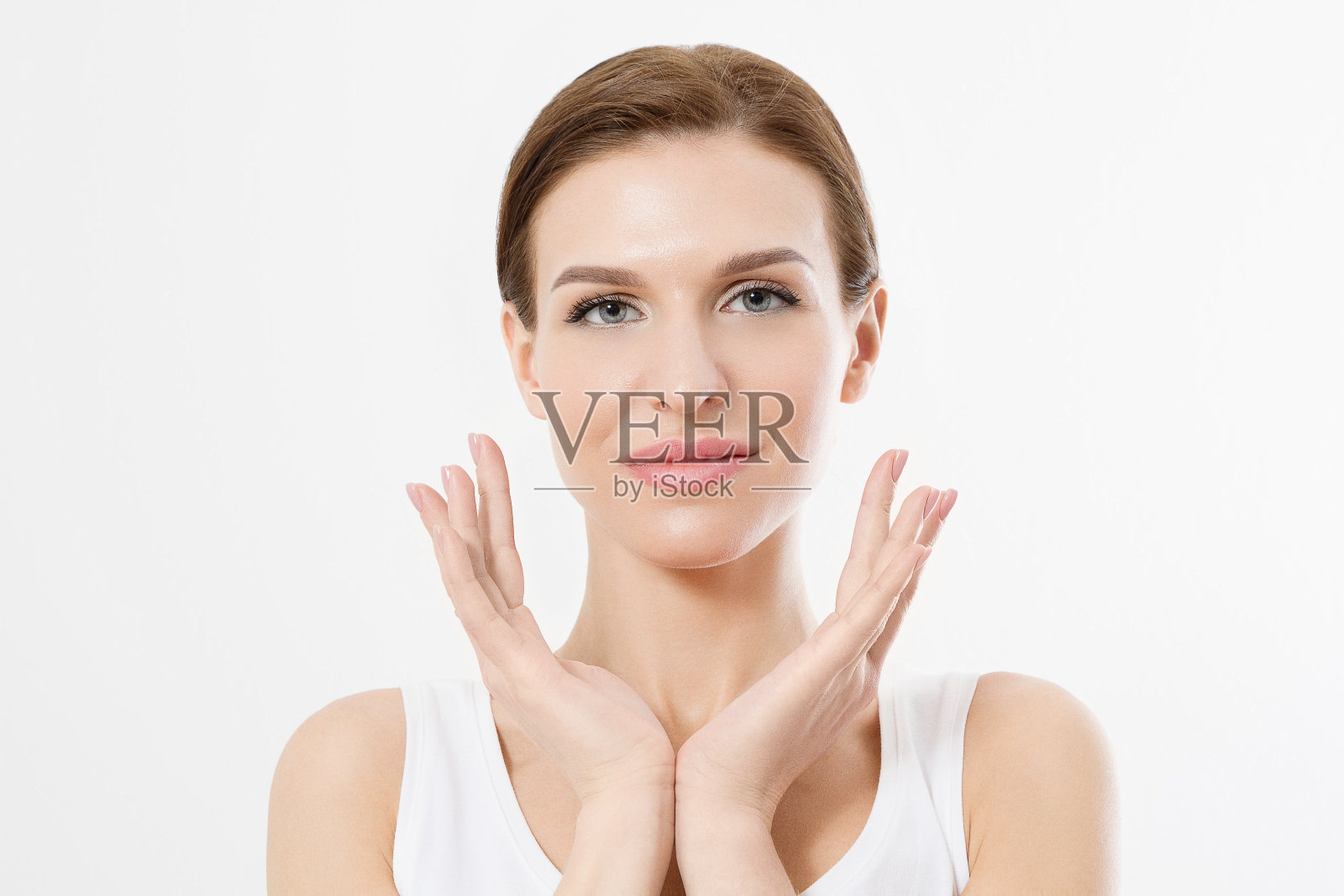 额头上没有皱纹的女性脸。皮肤护理和水疗美容。美容、面部治疗和抗衰老的概念。本空间照片摄影图片