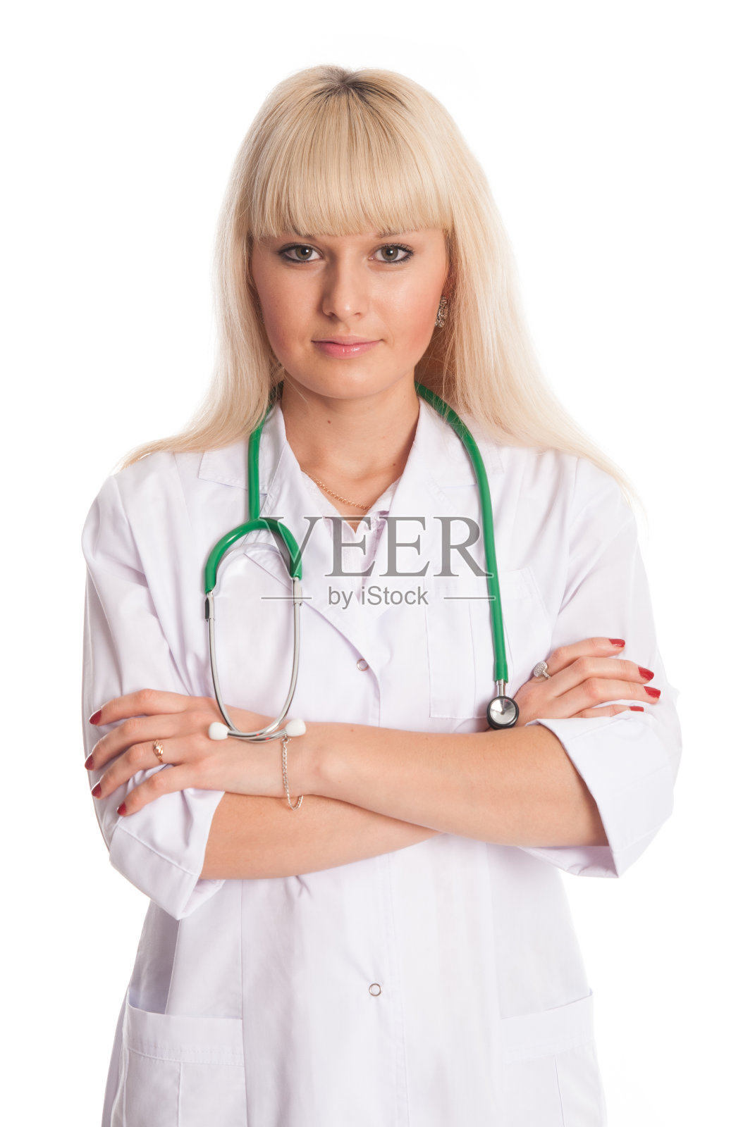 穿白大褂，双臂交叉的护士。照片摄影图片