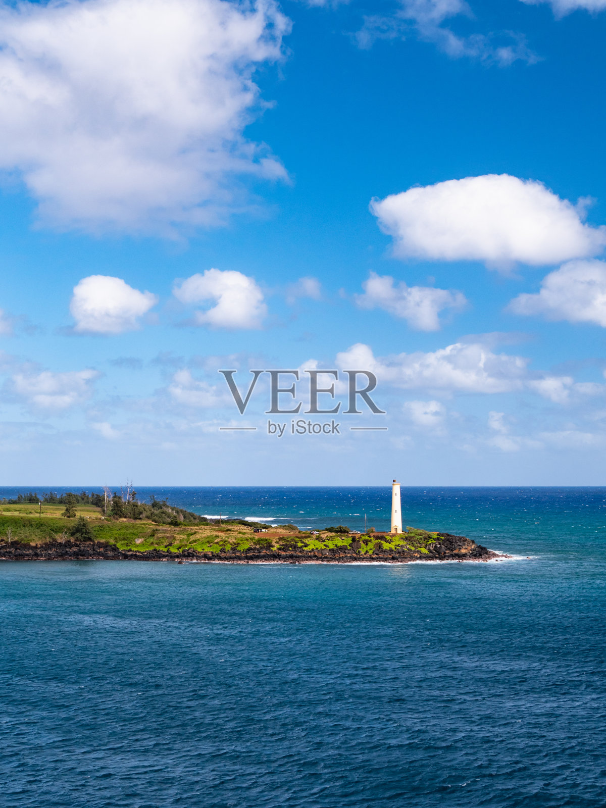 夏威夷考艾岛利休机场的尼尼尼角灯塔。照片摄影图片