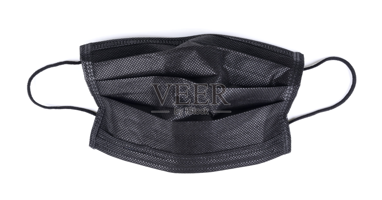 黑色一次性医用口罩与白色隔离照片摄影图片