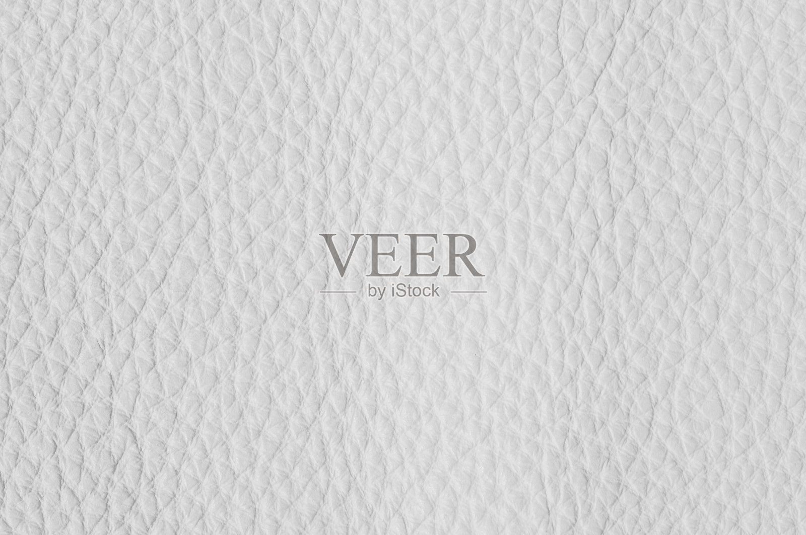 豪华白色皮革样品特写。可以用作背景。照片摄影图片