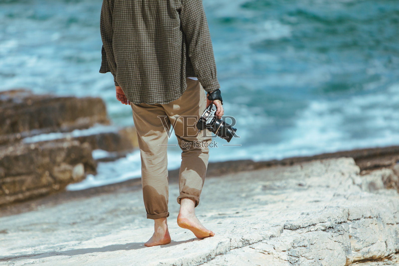 专业摄影师拍摄海景照片摄影图片