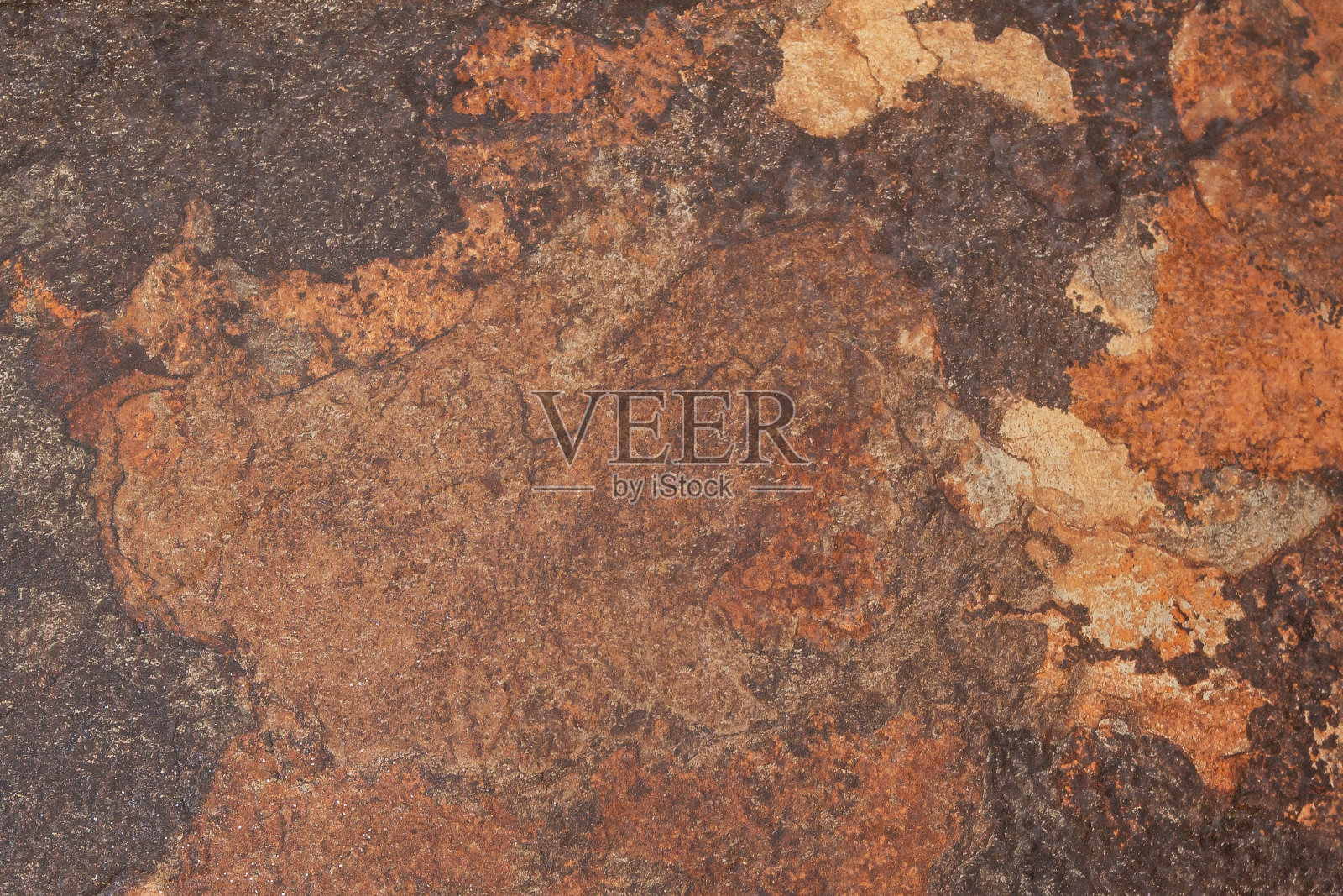 墙面纹理有裂缝和划痕，可以用作背景。背景图像的石材表面。背景。一堵破旧的墙。可用于家居内外装饰及瓷砖表面照片摄影图片