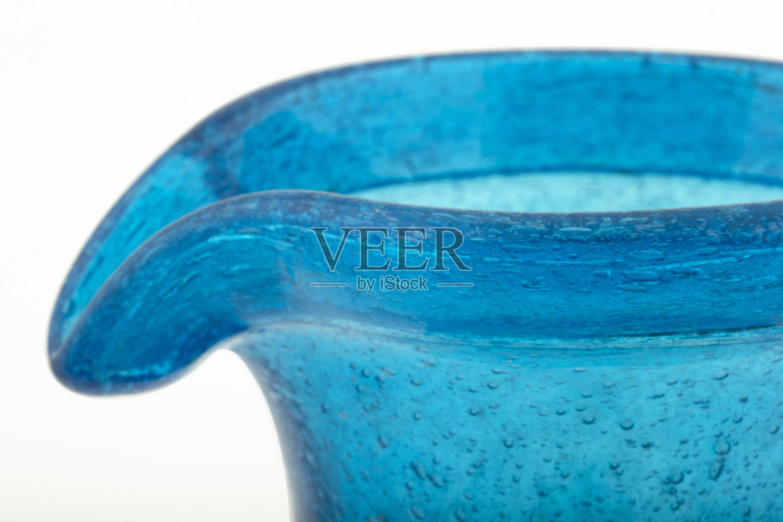 装饰用的蓝色旧玻璃壶照片摄影图片