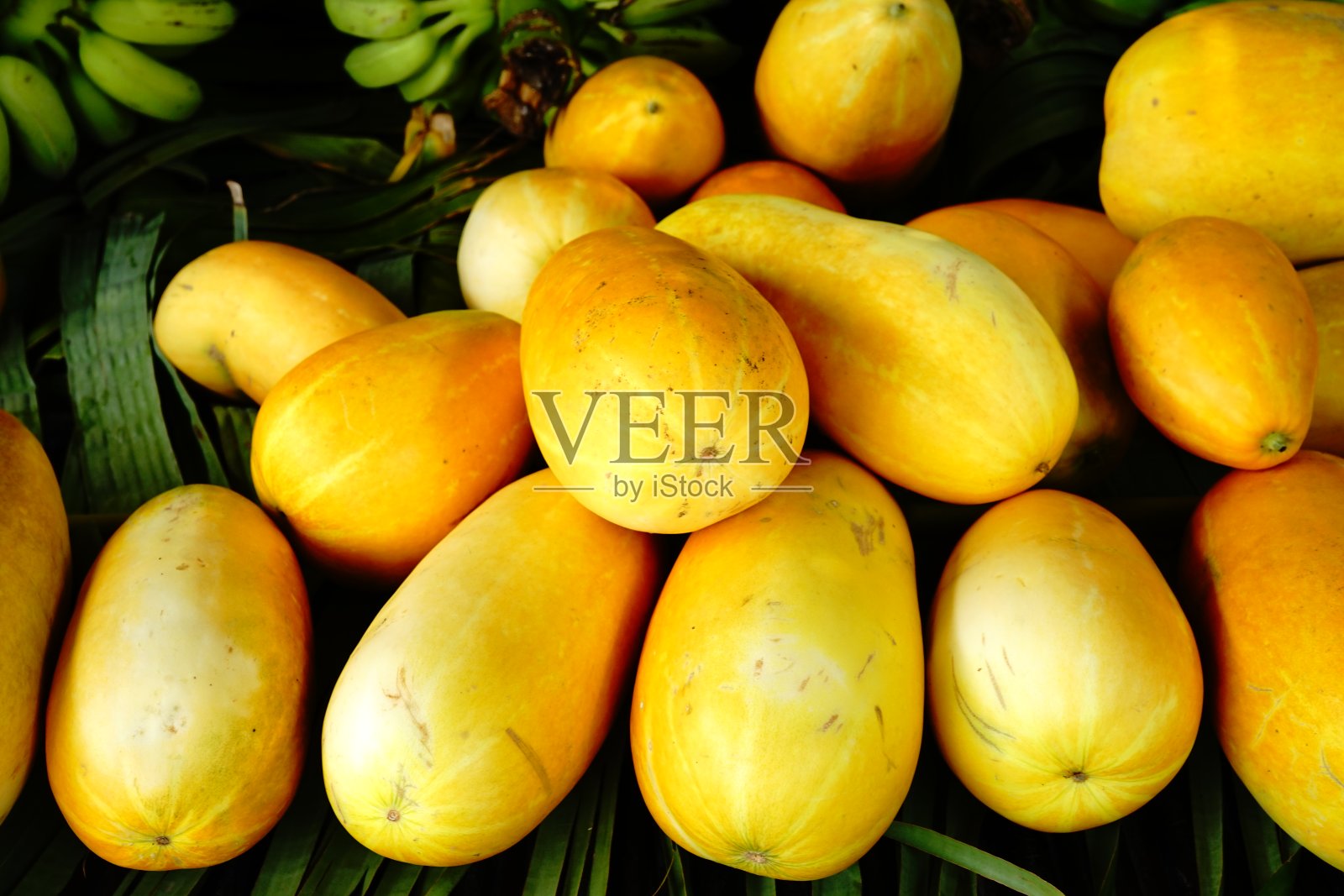 ํ黄色甜瓜卖照片摄影图片