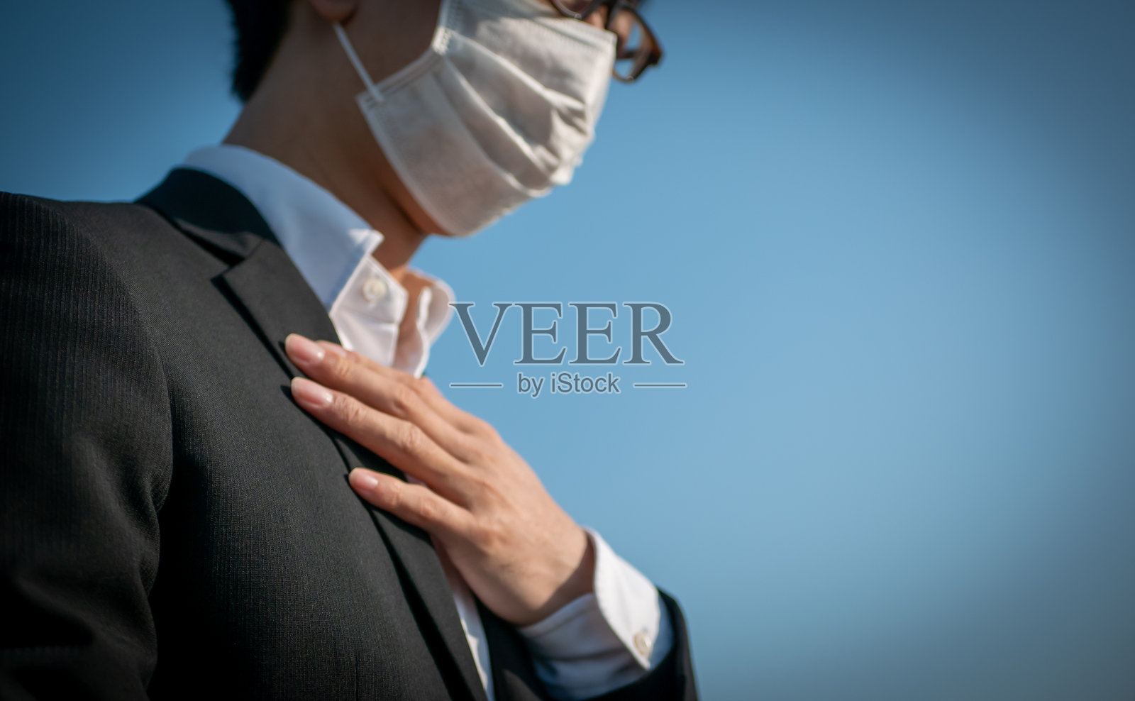 戴面具的商人照片摄影图片