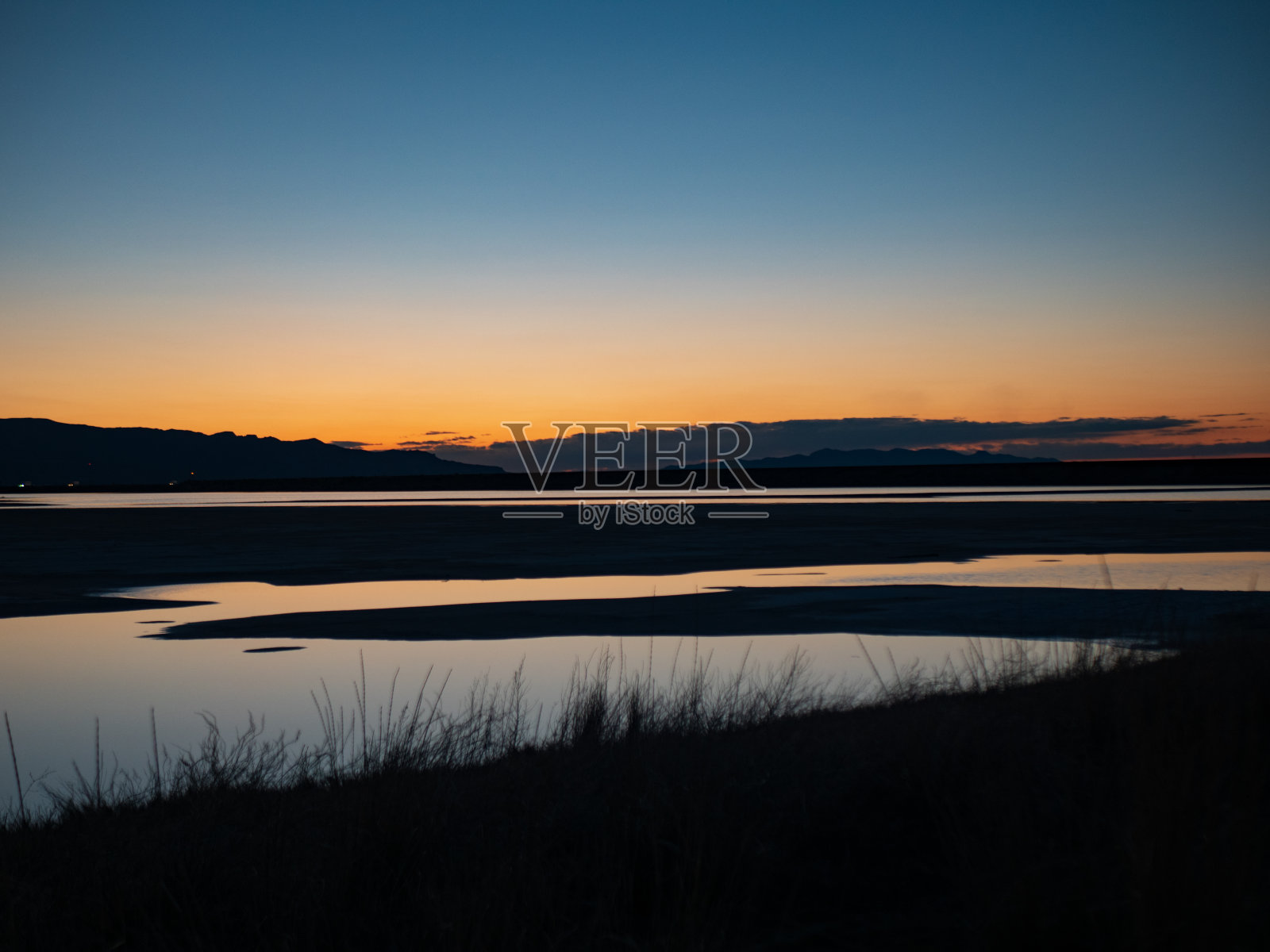 海湾上的日落照片摄影图片