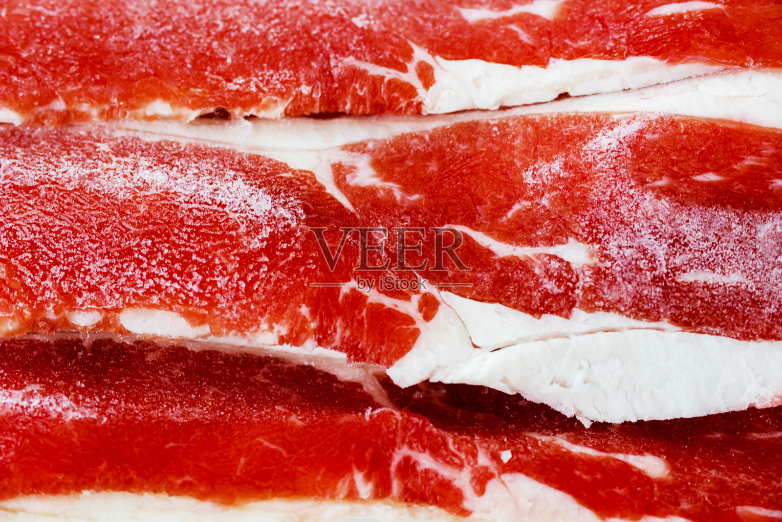 冷冻生牛肉片的细节照片摄影图片