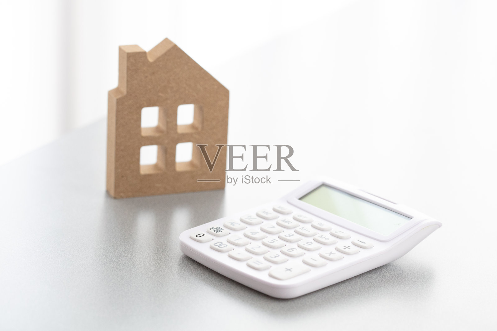 微型房屋和计算器照片摄影图片