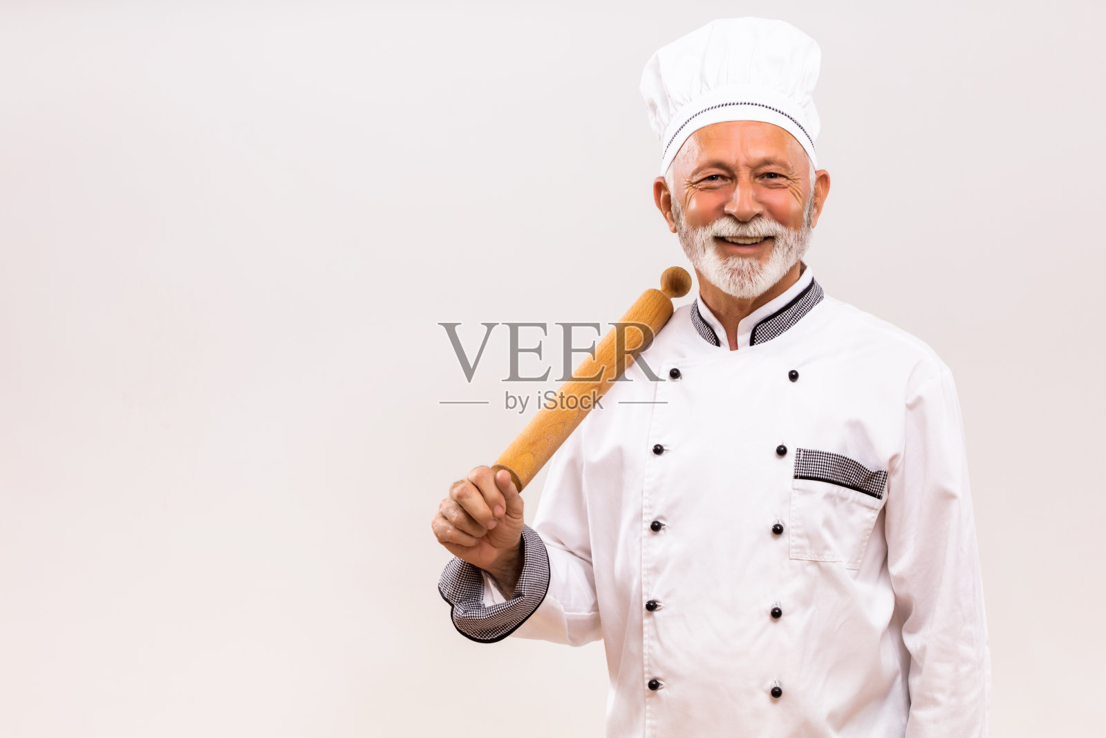 有擀面杖的高级厨师照片摄影图片