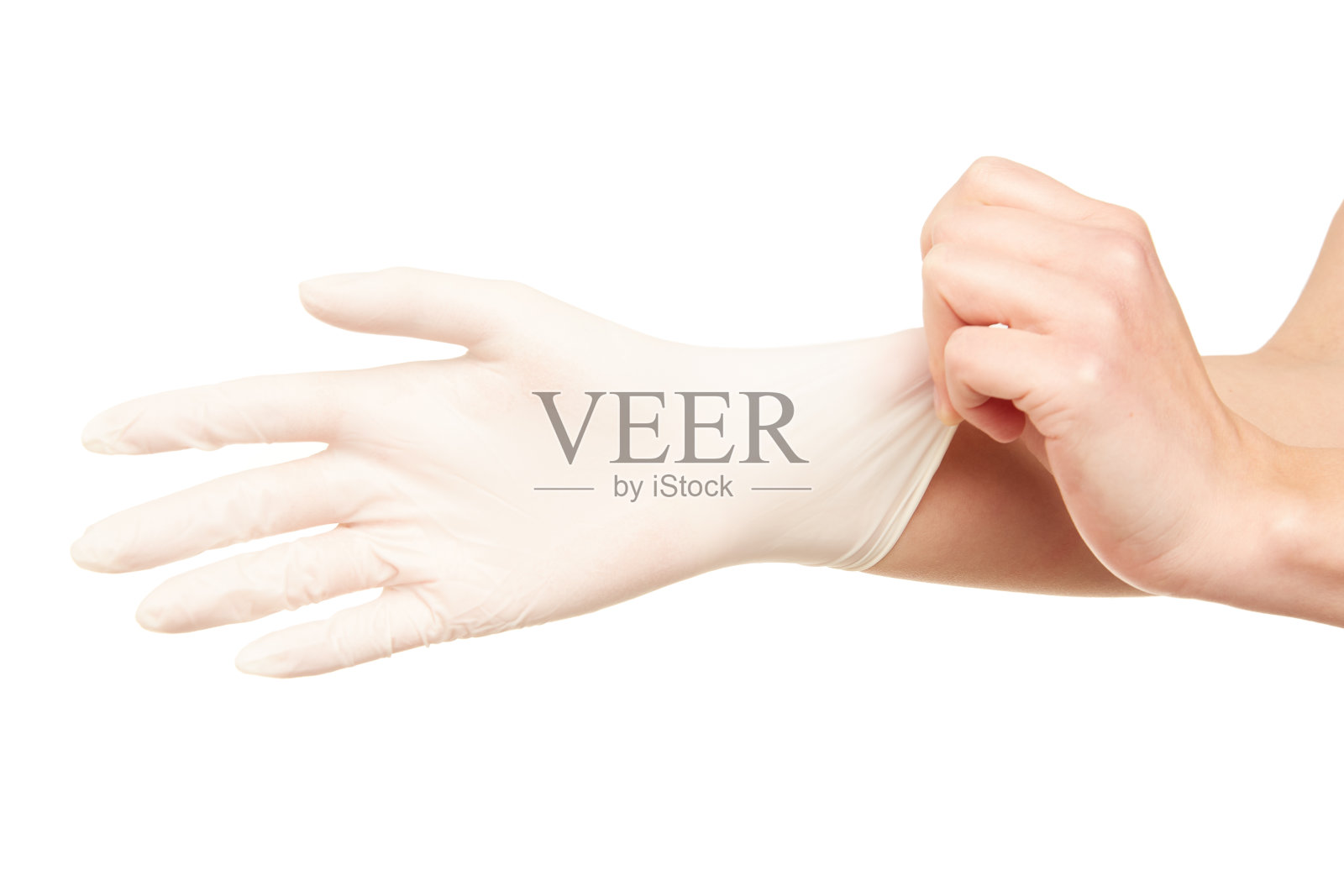 女人的手戴着外科手套照片摄影图片