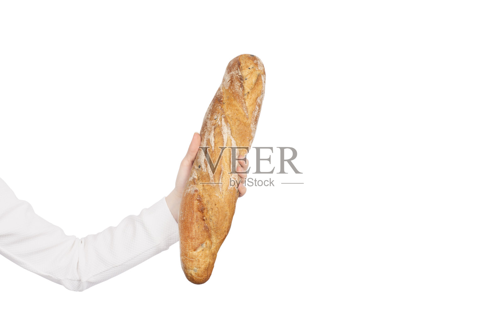 女人手里拿着法式长棍。照片摄影图片