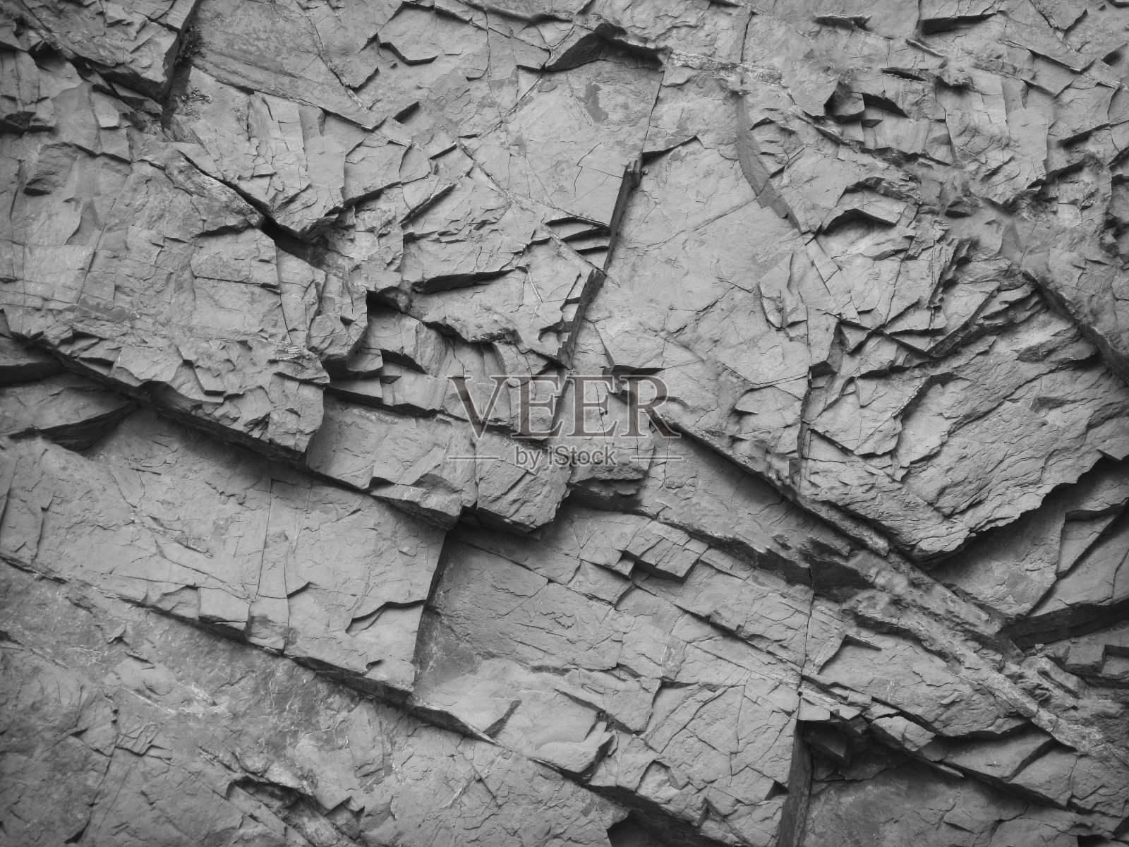 枯燥乏味的灰色背景。岩石纹理。黑白抽象背景。照片摄影图片