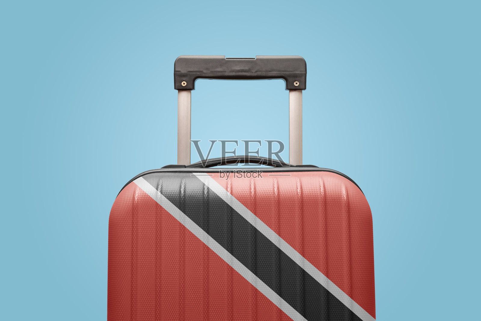 行李与特立尼达和多巴哥国旗印刷旅游和度假概念。照片摄影图片