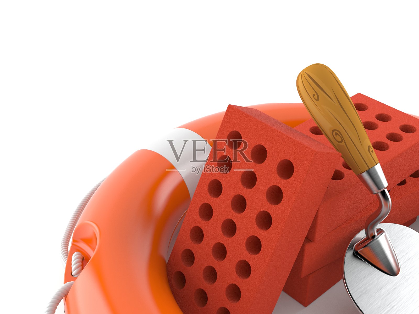 救生圈内的泥铲和砖块照片摄影图片