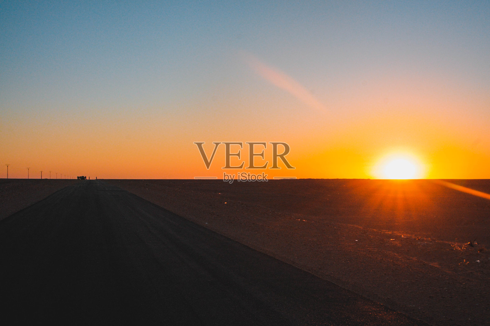 撒哈拉沙漠的日落照片摄影图片