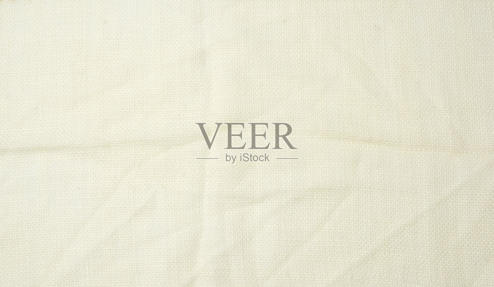 皱巴巴的米色合成布料，用于制作裙子衬里照片摄影图片