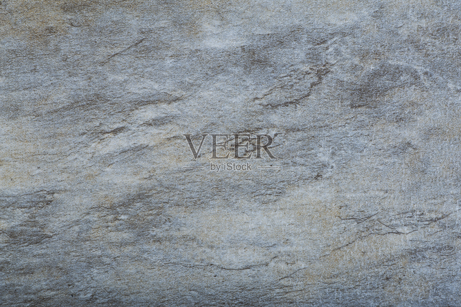 石花岗岩背景。背景与纹理和图案的石头和天然岩石，花岗岩或大理石。照片摄影图片