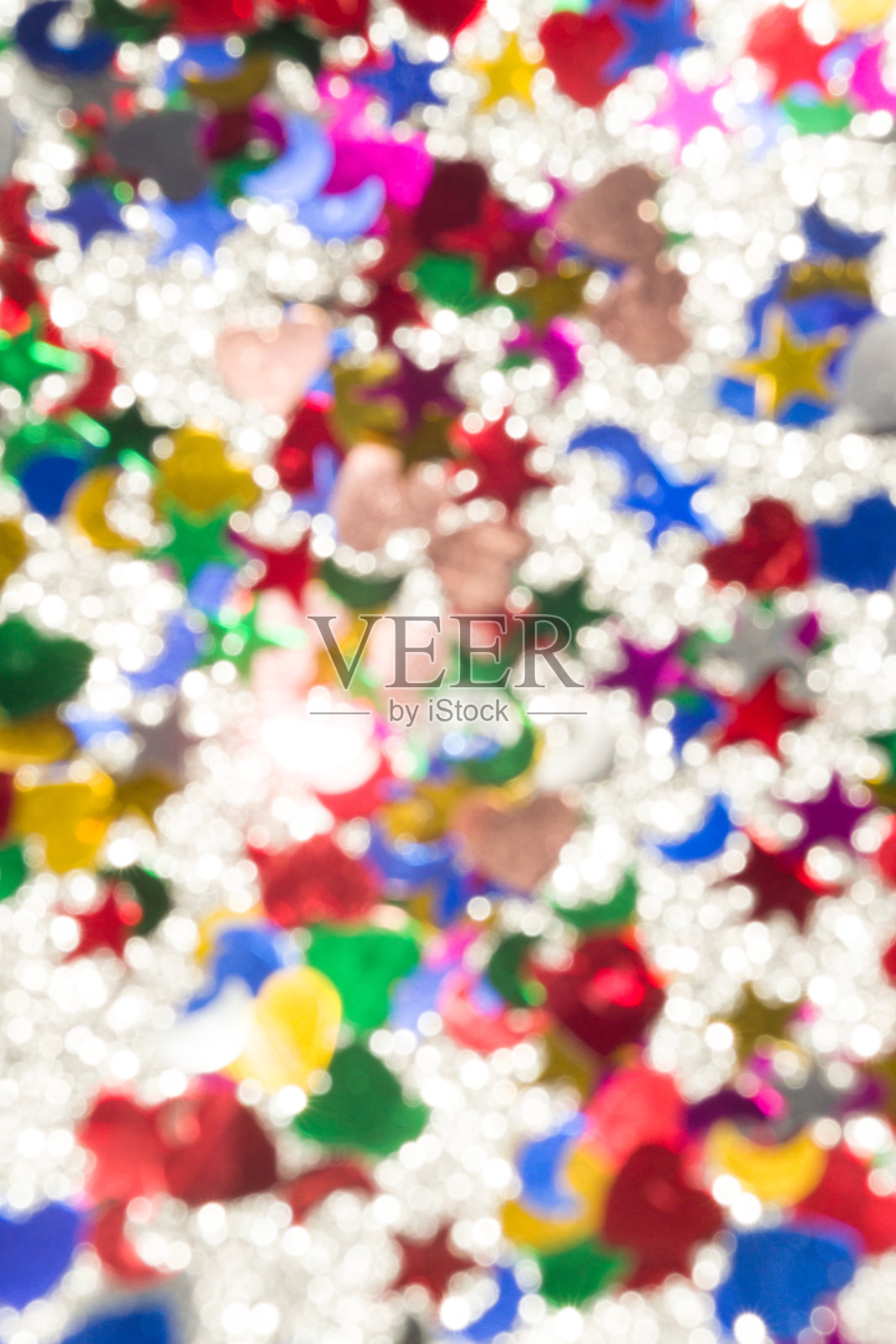 抽象闪烁的彩灯圣诞背景。de-focused照片摄影图片