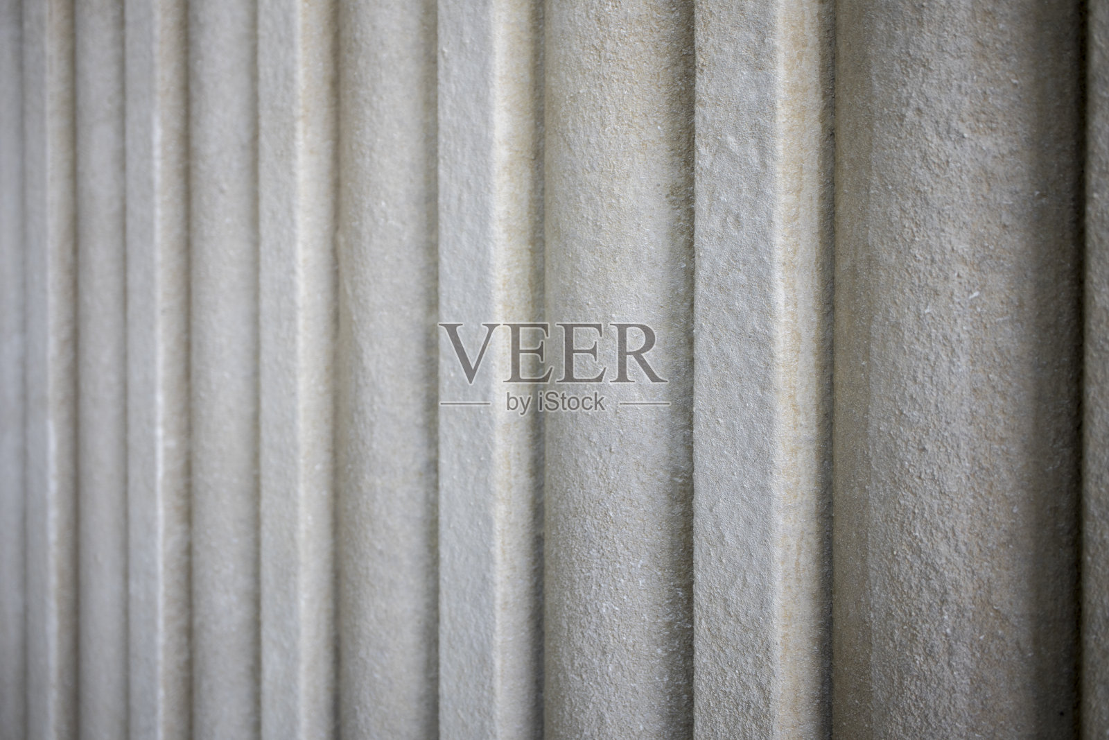 有圆柱的石墙。大理石geometry.exture。照片摄影图片