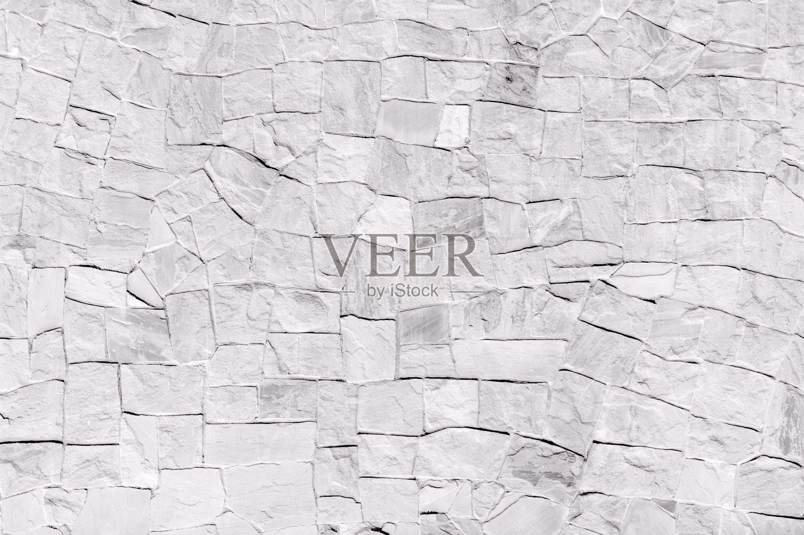 表面白色的石墙。白色石墙背景照片摄影图片