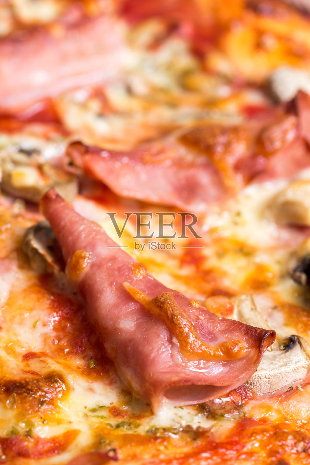美味的披萨配火腿芝士蘑菇照片摄影图片