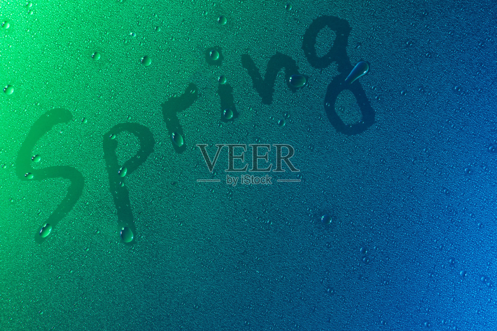 春天的符号在霓虹灯背景下滴趋势2020色水mena经典蓝色复制空间照片摄影图片