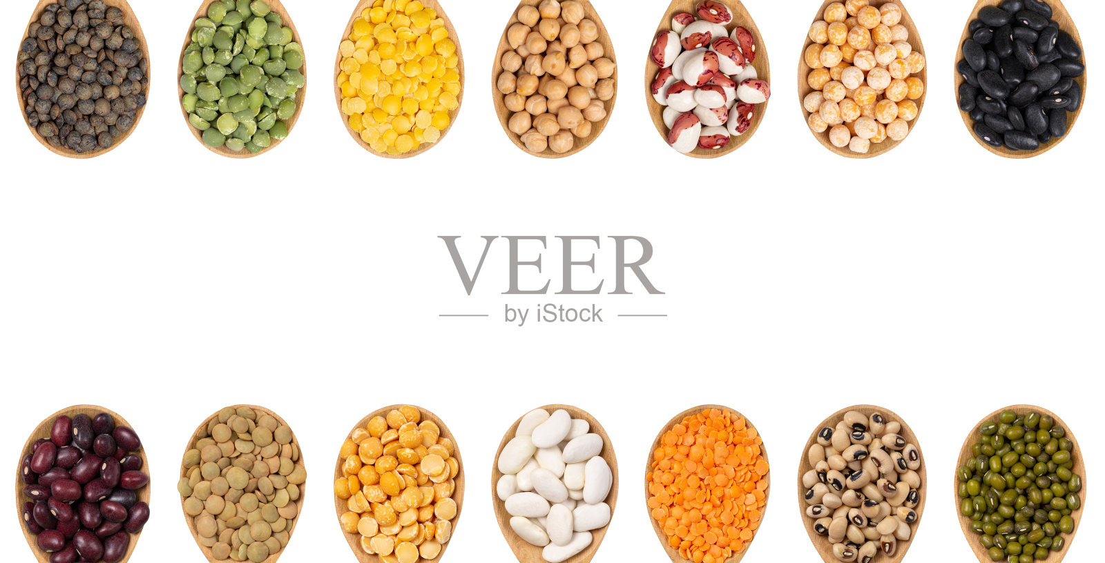 收集的豆科在木制勺子上的白色背景顶视图。照片摄影图片