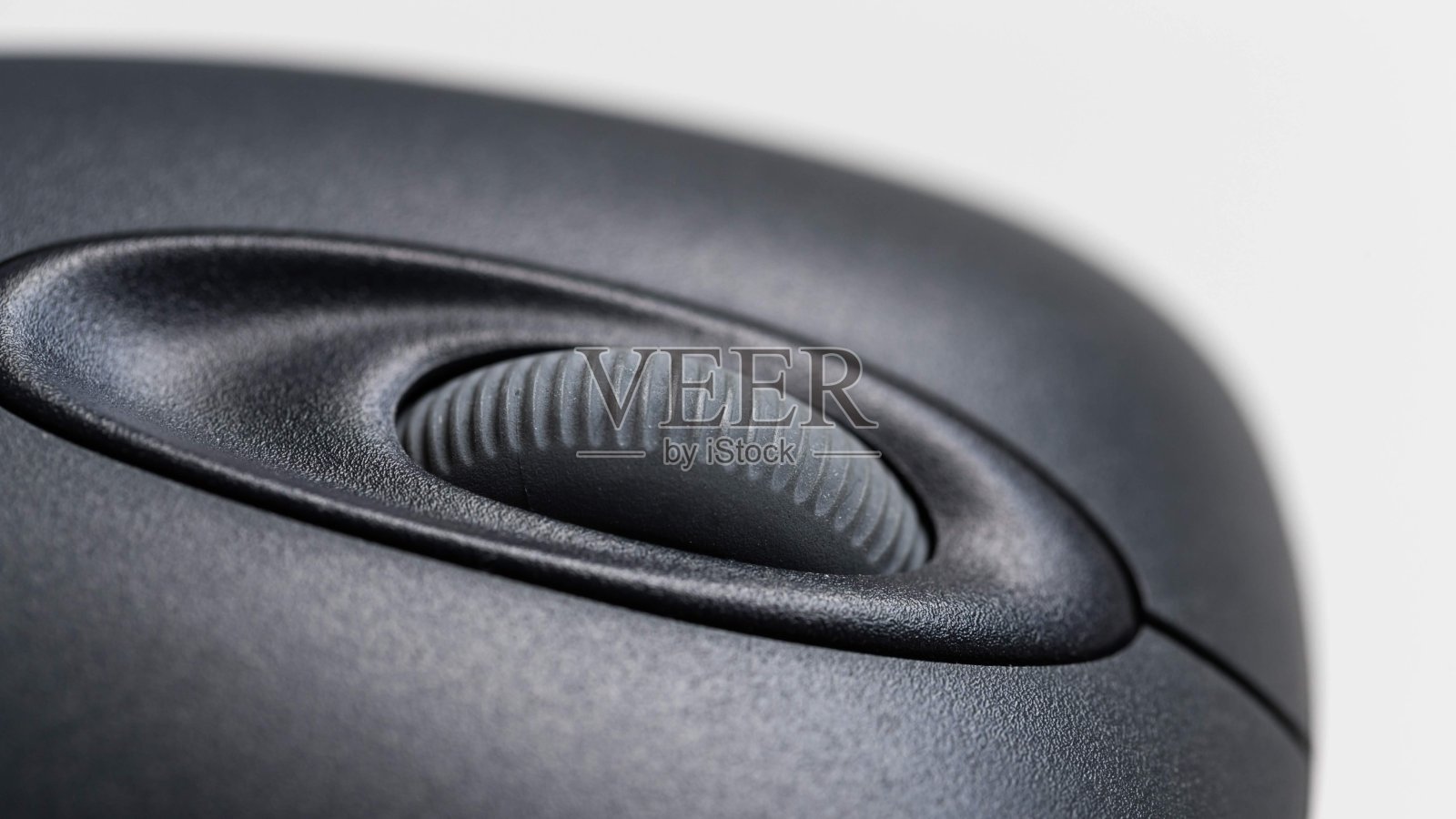 一个基本的黑色电脑鼠标滚动轮的宏特写照片摄影图片