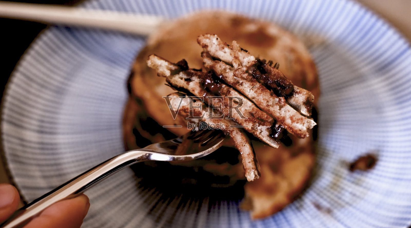 叉子上的煎饼照片摄影图片