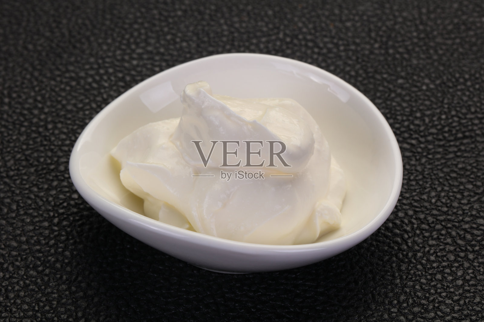 酸奶油在碗里照片摄影图片